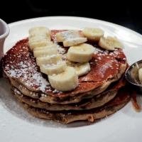 Banana-Blue Crunch Cakes · Multigrain batter mixed with almond granola and blueberries, topped with bananas and honey. ...