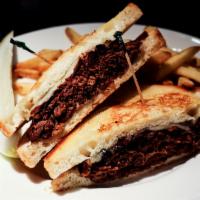 Pot Roast Sandwich · Staff faves. Slow-roasted tender pot roast in natural au jus, topped with melted swiss chees...