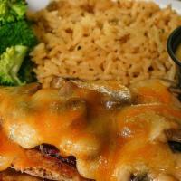 Grilled Chicken Dinner · 2 seasoned chicken breasts grilled or blackened and served with seasoned rice, steamed brocc...