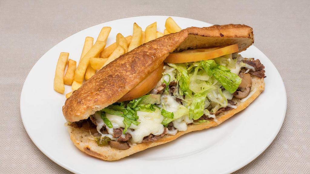 The Works Beef Steak Sub · Beef steak, green peppers, onions, mushrooms, mozzarella cheese, mayo, lettuce and tomatoes on fresh baked homemade bread.  Served with fries.