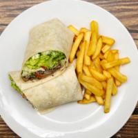 Steak Wrap · Prepared with Hellmann's mayo, lettuce, tomato, onions, steak, peppers and mushrooms. Served...