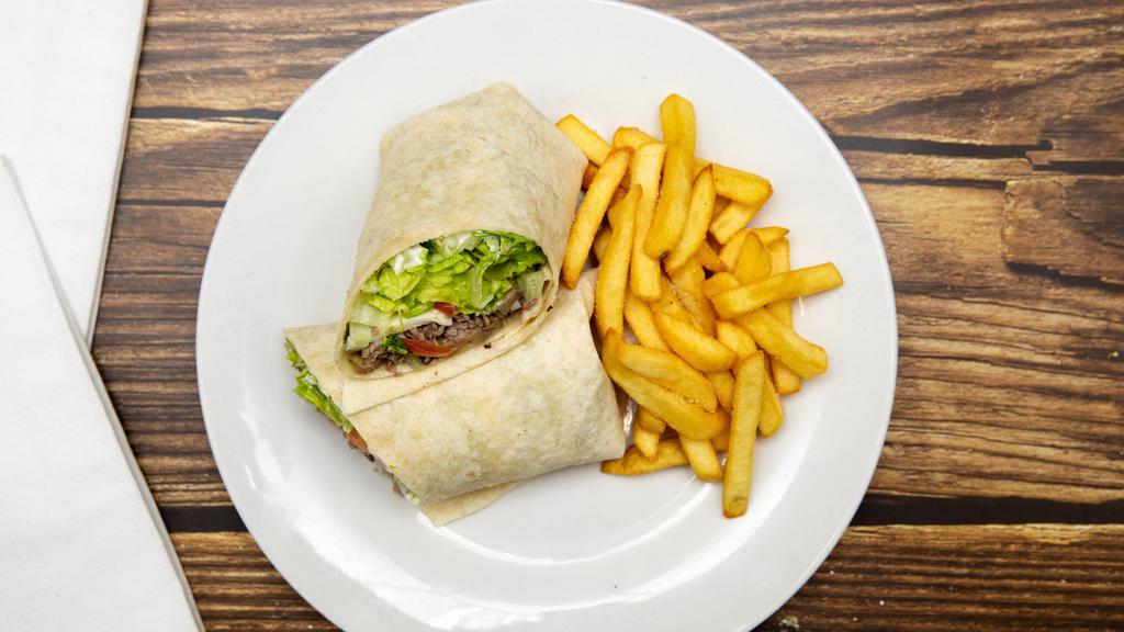 Steak Wrap · Prepared with Hellmann's mayo, lettuce, tomato, onions, steak, peppers and mushrooms. Served with fries.