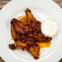 La Mia Char-Grilled Double Deep Wings · Grilled wings and double dipping in sauce. Intense flavor.