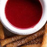 Funnel Cake Fries · It’s a “funnel cake” in french fry form. Perfect for sharing. They’re dusted with powdered s...