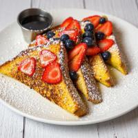 French Toast & Berries · served with fresh berries, maple syrup on the side.