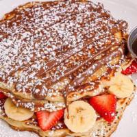 Pancake Express · 2 large pancakes, Nutella, strawberries, banana, maple syrup on the side.