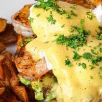 Cajun Shrimp Benedict · Open faced croissant topped with shrimp, avocado, tomato, pickled onions, 2 poached eggs and...