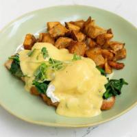 Florentine Benedict · open faced croissant topped with sautéed spinach, 2 poached eggs and hollandaise sauce on si...
