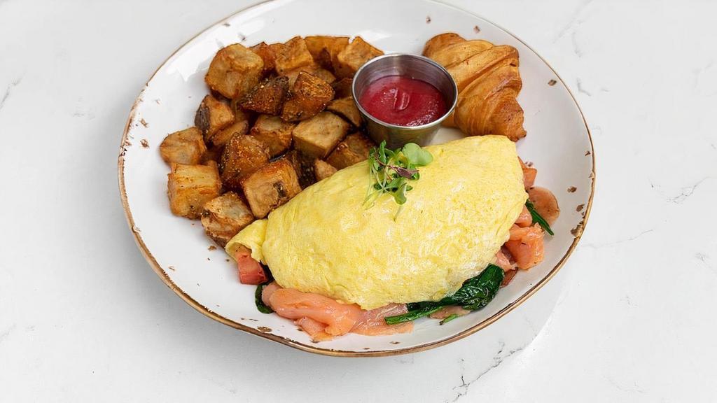 Smoked Salmon · 3 eggs omelette, smoked salmon, tomato, pickled onion, spinach and Truffle oil.. Served with breakfast potatoes, mini French croissant and homemade jam.
