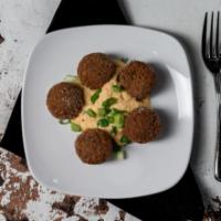 Falafel (5Pcs) · Classic Falafel Made in House, Served with Our House Made Hummus.