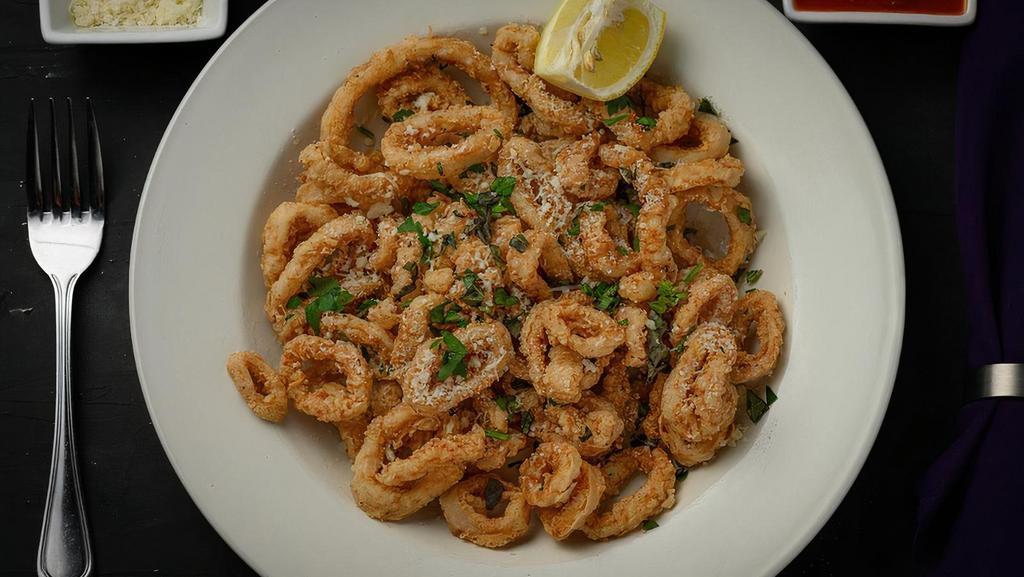 Fried Calamari · Wild caught. Fried Fresh to Order, Served with a Wedge of Lemon and Marinara.
