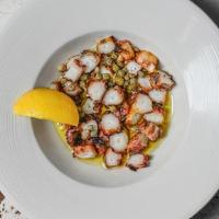 Grilled Octopus. · Our grilled octopus is tender, cooked over our charcoal grill, served with oregano, olive oi...