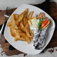 Chicken Wrap · Served with Onions, Lettuce, Tomato and Tzatziki Sauce.