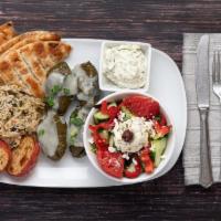 Grape Leave  Platter (4Pcs). · Served with a side Greek salad, side of tzatziki, spinach rice and rosemary lemon Potatoes. ...