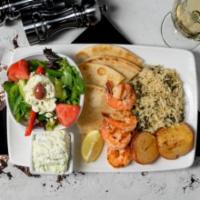 Shrimp Platter (5 Pcs). · Served with a Side Greek Salad, Spinach rice and Rosemary Lemon Potatoes.
