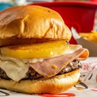 The Hawaiian Spicy Burger · 8oz Angus Beef with mozzarella, ham, pineapple and spicy sauce on a brioche bun
