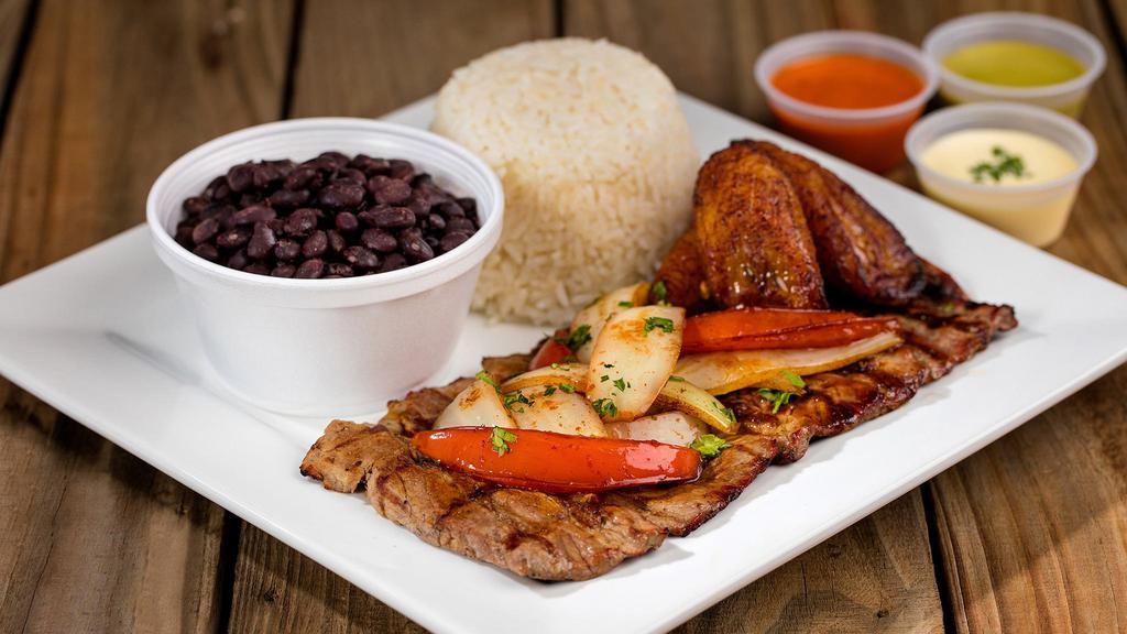 ½ Lb. Grilled Steak · With grilled onion, rice, beans, bananas, and soda.