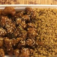 Sesame Chicken Or Beef · Crispy chunks of chicken with sesame seed and broccoli in special sauce.