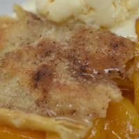 Southern Peach Cobbler · Just the way granny use to make them... sweet and tasty! Topped with a golden flakey crust