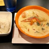 Shrimp Pineapple Curry · Large shrimp served with sweet basil, julienne bell peppers, fresh pineapple and coconut mil...