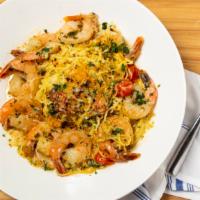 Shrimp Scampi · sautéed shrimp, white wine garlic butter broth, green onion, Parmesan bread crumb topping.
