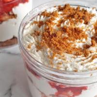 Strawberries & Cream · A favorite. Creamy, delicious cheesecake layered with graham cracker crust, whipped cream, s...