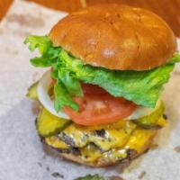 The Village Burger · Two 100% fresh (never frozen) beef patties with your favorite toppings. Default is that burg...