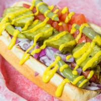Chicago Dog · Topped with mustard, relish, onion, pickle, tomato, sport peppers and celery salt.