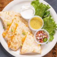 Quesadilla · Melted cheddar and jack cheeses, served with housemade pico de gallo, sour cream, and tomati...