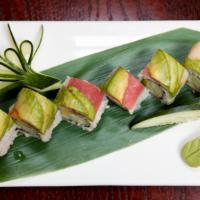 * Rainbow Roll · California roll topped with tuna, salmon, yellowtail, and avocado.