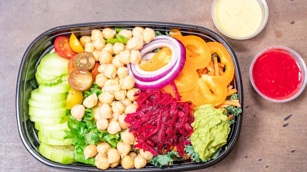 Loaded · Choice of kale or romaine lettuce, cucumber, shredded, avocado, sweet pepper, red onion. House special raspberry dressing, choice of black bean or chickpeas.