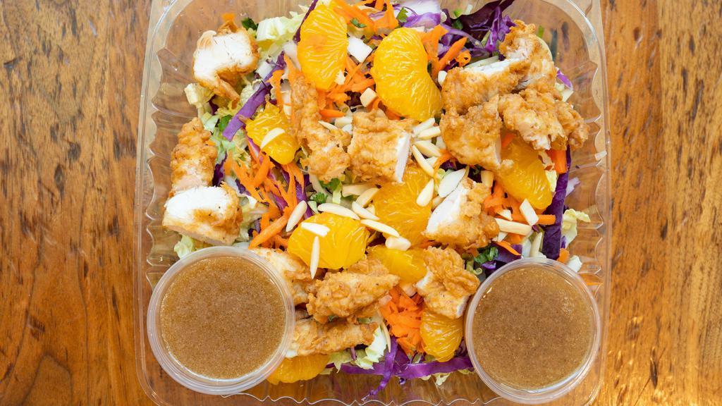 Asian · Fresh, all natural, antibiotic-free chicken, buttermilk fried, grilled, or vegan. Avocado, carrots, cilantro, green onions, jalapeños, Mandarin oranges, Napa & red cabbage, almonds. Includes up to two homemade sauces & dressings.
