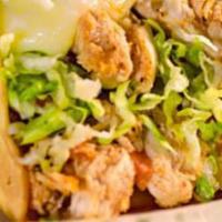 Taco Loco · Seasoned shredded chicken on a bed of lettuce, shredded cheese, sour cream and diced tomatoe...
