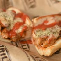 Chicken Parmesan · Grilled breast strips, pizza sauce, provolone cheese, parmesan cheese, oregano.