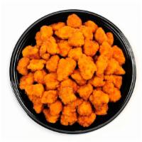 Boneless Wings (100) · Cooked wing of a chicken coated in Buffalo sauce.