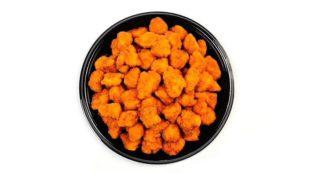 Boneless Wings (100) · Cooked wing of a chicken coated in Buffalo sauce.