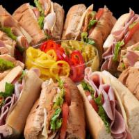 Party Miami Subs · Choice of Turkey, Tuna, or Vegetarian subs topped with fresh veggies and condiments on the s...