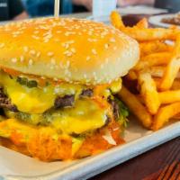 The Big Kim (Double Stack Cheeseburger) · two all beef patties, special sauce (kimchi mayo), lettuce, cheese, pickles, onions on a ses...