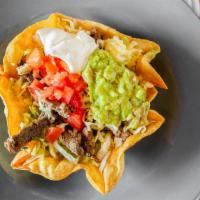 Taco Salad Cazuela · A bowl shaped flour tortilla deep fried and filled with your choice of meat, lettuce, cheese...