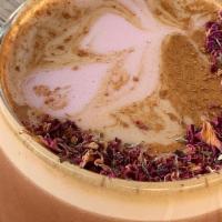Rose Latte · Our signature latte comes with a double shot of espresso, beetroot cinnamon blend, dusted wi...