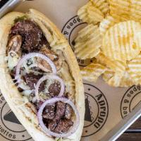 Philly Cheese Steak Hot Baguette · Grilled philly steak, melted Mozzarella cheese, green peppers, red onions, and sliced mushro...