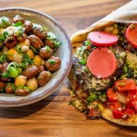 Falafel Wrap · fried patties of ground chickpeas, herbs & spices, pickled radish, tabbouleh, lettuce, tomat...