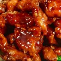 General Tso'S Chicken · Hot and spicy. Tender chicken lightly breaded with garlic spicy brown sauce, served over ste...