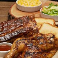 Rib & Chicken Plate · Half Rack of Baby Back Ribs & Smoked Half Chicken. Served with Two Medium Sides and Texas To...