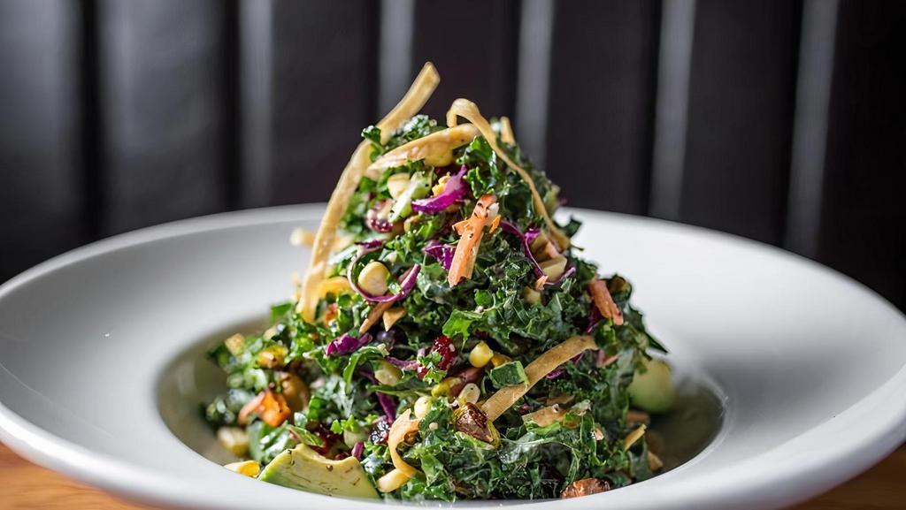 California Salad · Taylor Farms kale, roasted sweet potato, pistachio, dried cranberries, wasabi peas & tortilla strips in a roasted garlic dressing