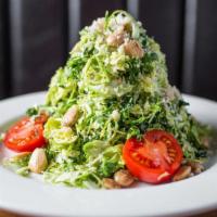 Brussels Sprout Salad · house shredded brussels with a bit of kale & marcona almonds with basil vinaigrette & parmig...