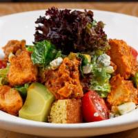 Buffalo Chicken Salad · hand breaded tenders tossed in buffalo with red onion, danish blue, croutons and roasted gar...