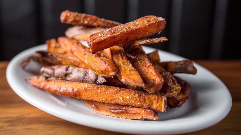 Hand-Cut Sweet Potato Fries · Hand-cut and seasoned to perfection