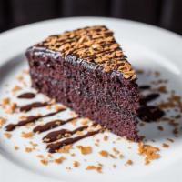 Rob'S Double Decker Chocolate Cake · topped with chocolate sauce and crispy wafer