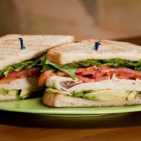Que Tal Pavo Sandwich · House made sandwich made on french bread with fresh turkey, lettuce, mayo, and a lime salsa ...